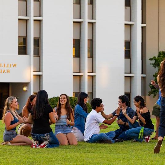 Media card - first-year students on the lawn